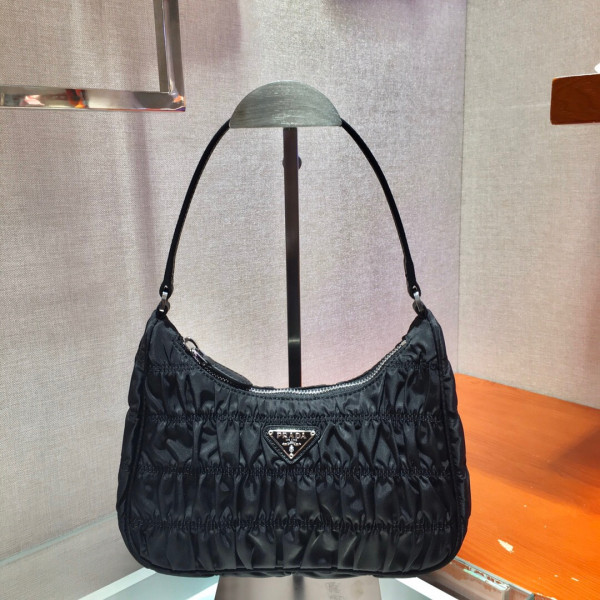 Pra*a nylon and saffiano leather mini bag