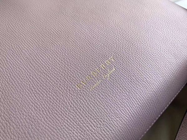 B**rry the medium banner in leather and house check