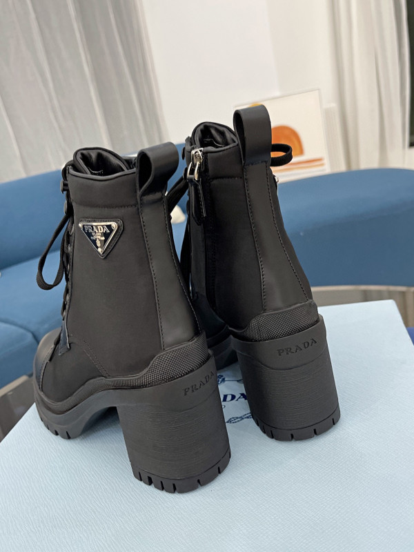 Pra*a brushed leather and nylon laced booties