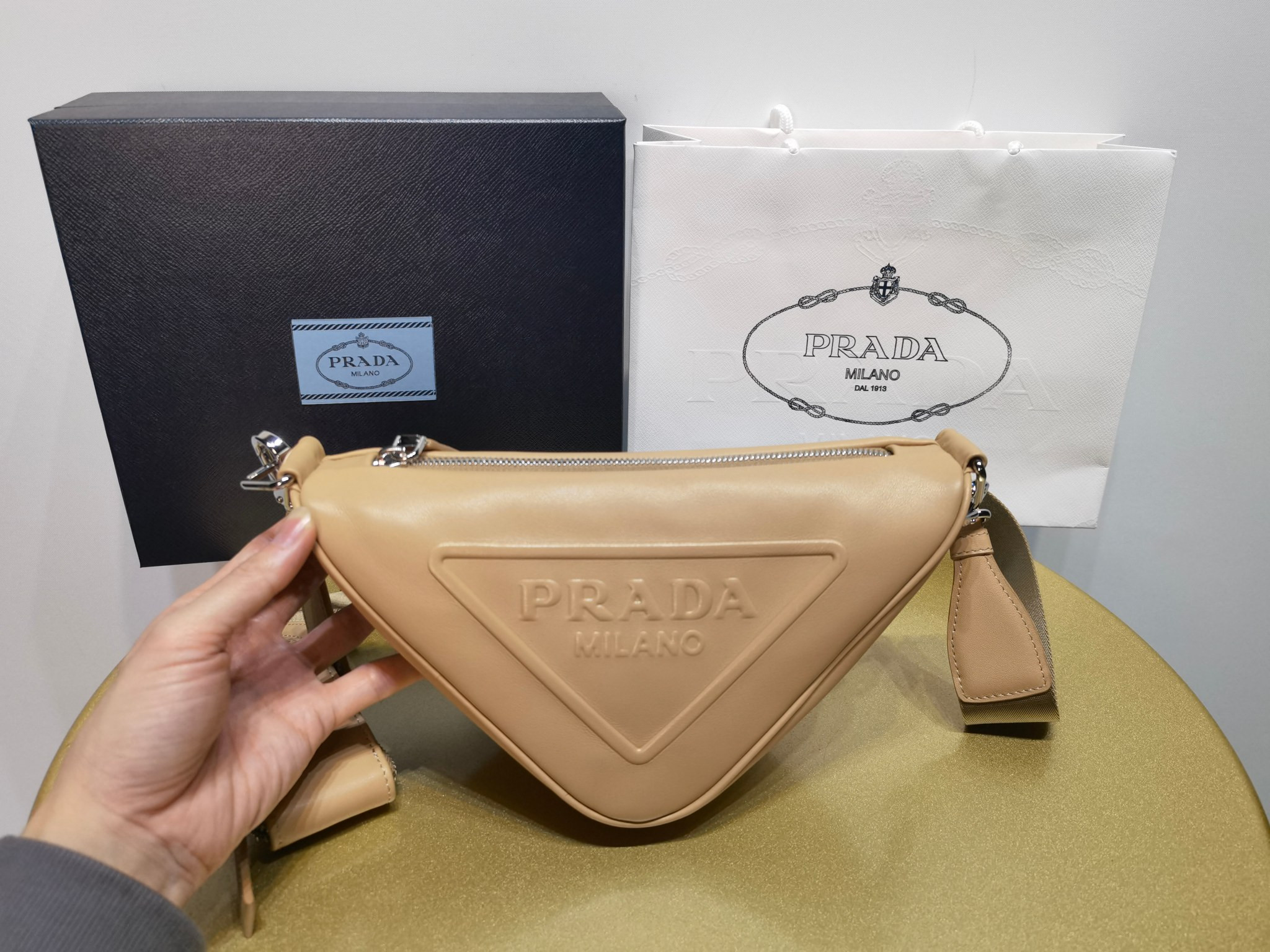 Pra*a triangle bag